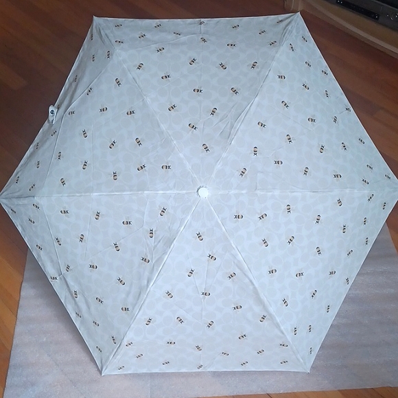 Coach Accessories - COACH Umbrella In Signature Bee Print NWT Price FIRM